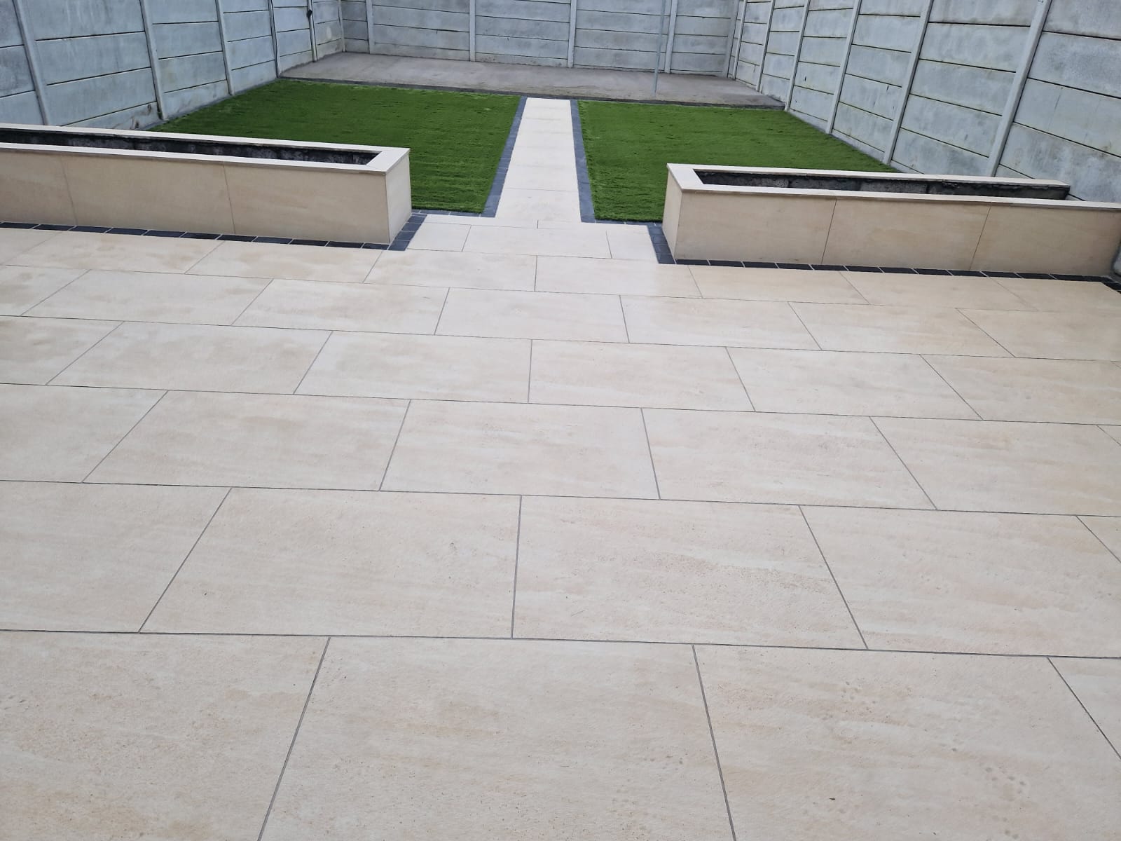 Professionally completed tiling full back garden makeover