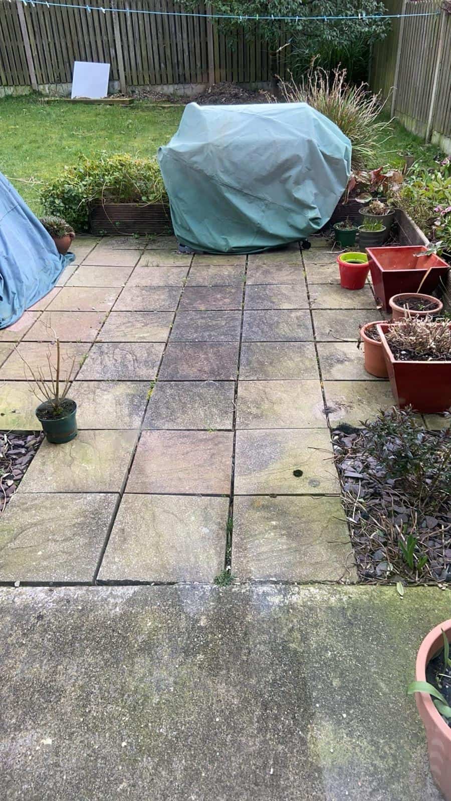 Original worn, uneven patio before the 4Greenfields renovation