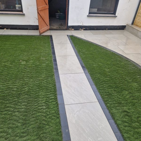Newly laid path and fresh grass